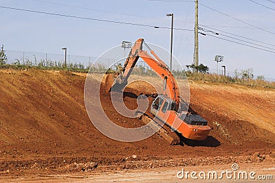 Climbing trackhoe 1 Stock Photo