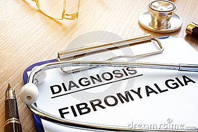 Clipboard with diagnosis fibromyalgia. Stock Photo