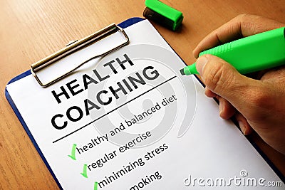 Clipboard with health coaching list. Stock Photo