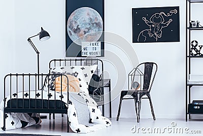 Astronomic bedroom interior with posters Stock Photo