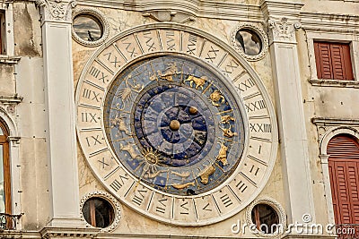 Clock dell`Orologio on St Mark`s Square San Marc in Venice, Italy. Detail with clock face and astrological Zodiac signs Stock Photo