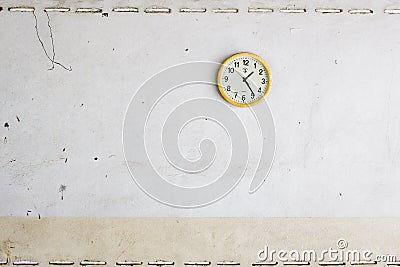 Clock and dirt wall Stock Photo