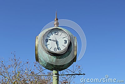 Clock four sided town square Stock Photo