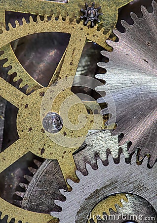 Clock mechanism gears and cogs close up Stock Photo