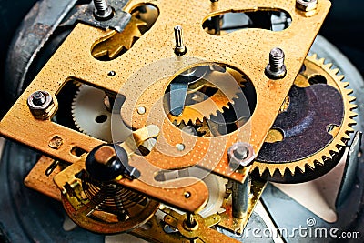 Clock mechanism gears and cogs. Metal gears of old clock mechanism. Clockwork background Stock Photo