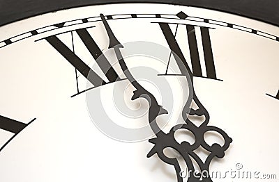 Clock at almost midnight Stock Photo