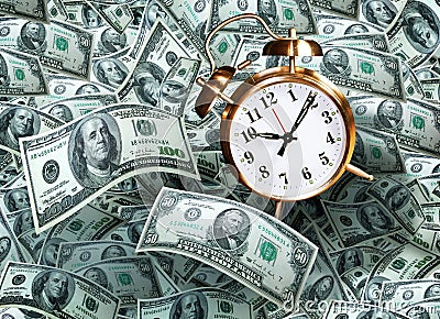 Clock on money Stock Photo