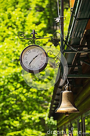 Clock and railway bell. Guam gorge, Krasnodar Russia Stock Photo