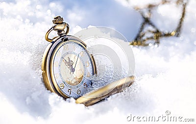 Clock showing five minutes to twelve. Time to stop and realize the values of life. Stock Photo