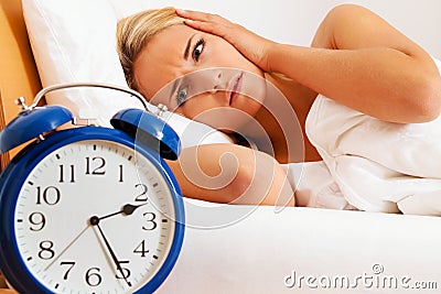 Clock with sleepless at night. Stock Photo