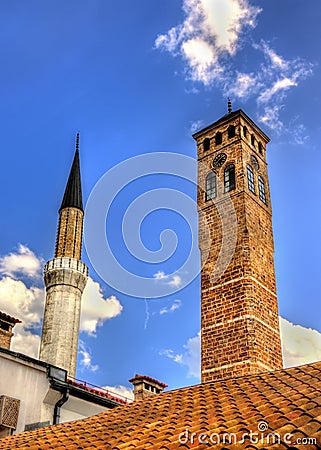 Clock tower and Gazi Husrev-beg Mosque Stock Photo