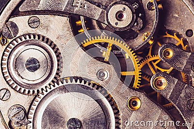 Clockwork Background. Old Clock Watch Mechanism. Retro Clockwork Stock Photo