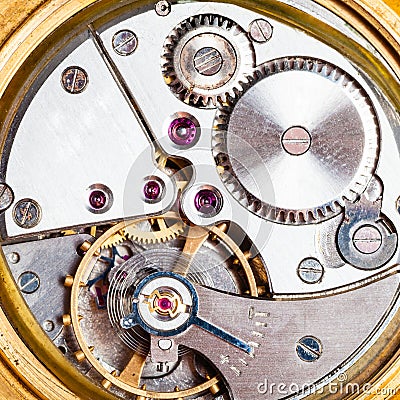 Clockwork of old mechanical golden watch Stock Photo