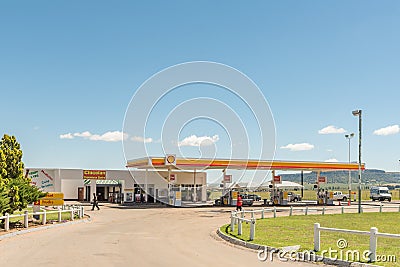 Street scene with gas station in Clocolan Editorial Stock Photo