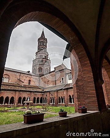 Cloister and bell tower of the abbey of Chiaravalle Stock Photo