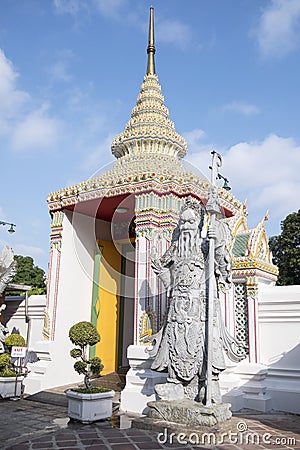 Cloister of Wat Pho Temple with Chinese Guardian Statue Stock Photo