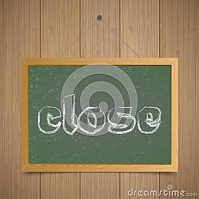 Close. Chalk board with wooden frame on a wooden background Stock Photo