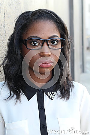 Close face of African female with glasses Stock Photo