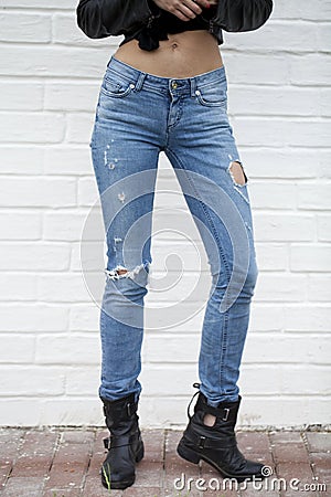 Close female blue jeans Stock Photo