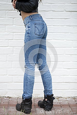 Close female blue jeans Stock Photo