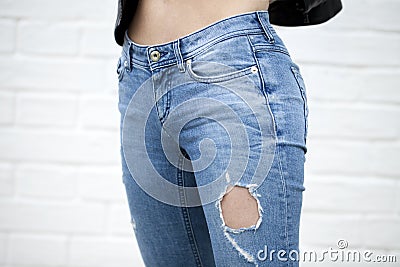 Close female blue jeans Stock Photo