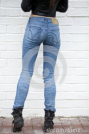 Close female blue jeans Stock Photo