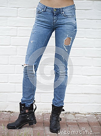 Close female blue jeans Stock Photo