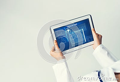 Close of female doctor hands working with tablet pc computer Stock Photo