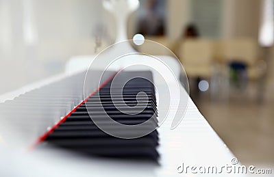 Close frontal . The piano was set up in the music room to allow the pianist to rehearse before the classical piano performance in Stock Photo