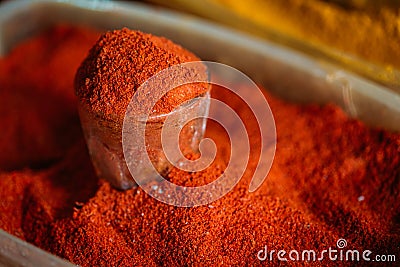 Close Glass With Powdered Paprika, Cayenne Pepper. Heap Of Bright Red Fragrant Spice Stock Photo