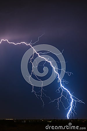 Lightning bolt strike in a thunderstorm Stock Photo