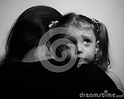 Close between loving supporting mother and sad daughter Stock Photo