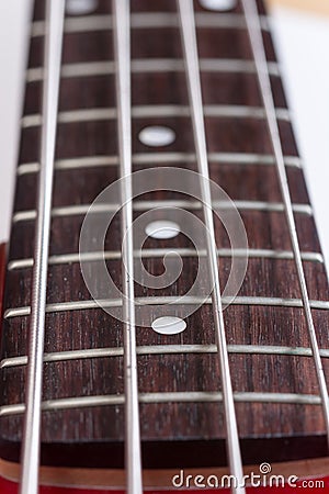 Close macro guitar bas frets neck strings Stock Photo