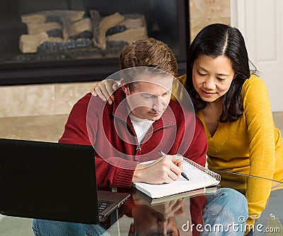 Close Mature Couple Working from their Home Stock Photo