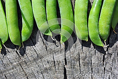 Close ripe green pods of sweet peas, organic texture Stock Photo