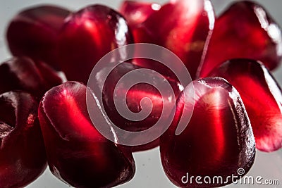 Close of ripe, juicy, red pomegranate seeds Stock Photo