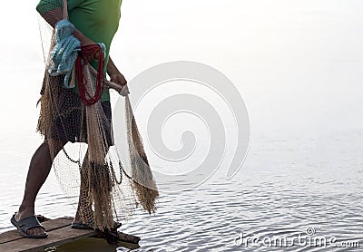 Close up of a man preparing to sow fishing. Stock Photo