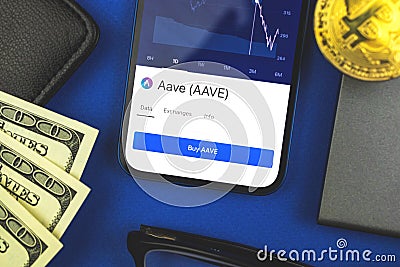 Close-up of AAVE crypto currency sumbol displayed on the screen, business financial background, top view photo Stock Photo