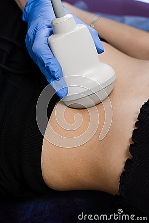 Close-up abdominal ultrasound for examination of tumors, cysts and polyps, cirrhosis, hepatitis and inflammation Stock Photo