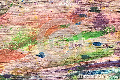 Close-up of abstract dirty painted wooden surface, paint of different bright colors Stock Photo