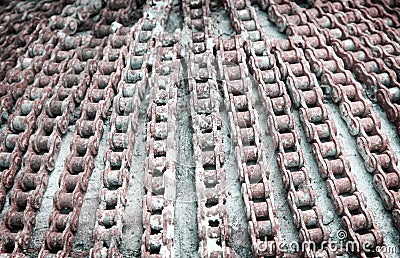 Abstract old motorcycle roller chain with rusty decorative on concrete texture for background Stock Photo