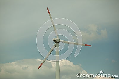 Close up abstract view of a giant wind turbine with blue sky Stock Photo