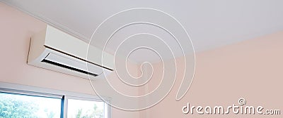 Close up air conditioner split type wall mounted in home room concepts of cool or heat or air cleaning filter and service repair. Stock Photo