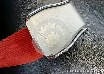 Close up of an aircraft safety belt buckle Stock Photo