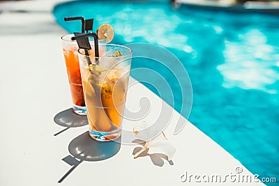 Close-up of alcoholic drinks, ice and gin and tonic lemonade and mojito with lime served cold Stock Photo