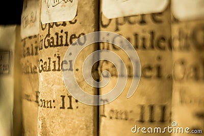 Close up of ancient galileo galilei books on display at bologna university library in italy, symbol of science and knowledge Editorial Stock Photo