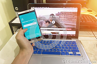 Close up Android device Showing Airbnb application on the screen Editorial Stock Photo