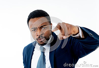 Close up of Angry young businessman boss accusing, blaming or threatening employee Stock Photo