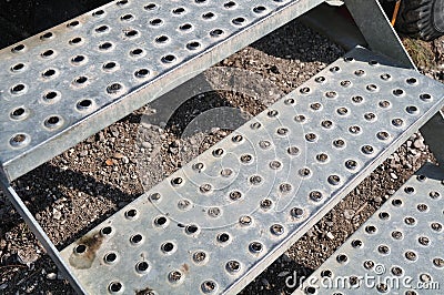 Close-up of antislip steps of perforated metal plates Stock Photo