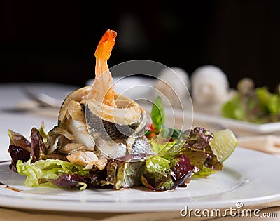 Close up Appetizing Sea Food Recipe on Vegetables Stock Photo